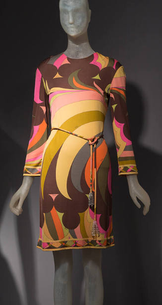 Long sleeve shift dress with large scale frond and lobe print in earth tones; belt with clear b…