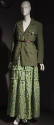 Miliarty style green jacket with belt and green floral tiered ankle length skirt 