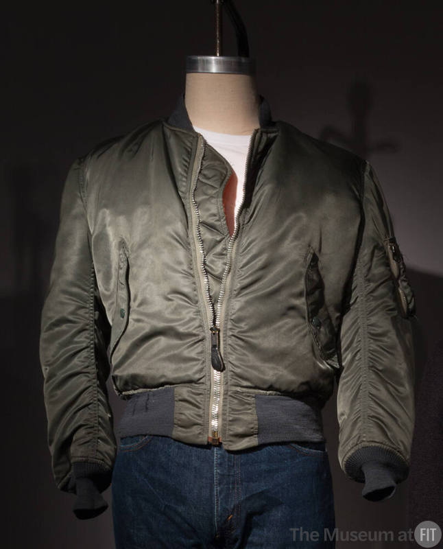 Green nylon zip front flight jacket with sanp pockets and ribbed collar and cuffs
