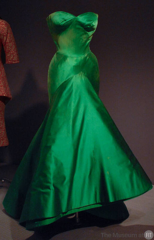 Green satin strapless fittted dress with asymmetric skirt 