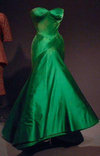 Green satin strapless fittted dress with asymmetric skirt 