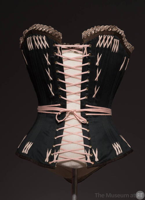 Black corset with pink lace top trim, pink lace closure and pink X stitches throughout