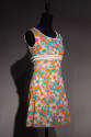 Orange, blue, pink and white floral print sleeveless mini dress with white trim at empire waist