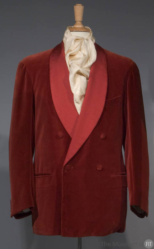 Man’s red double-breasted smoking jacket with shawl collar and two front slash waist pockets dr…