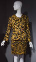 Black and gold Florentine baroque print suit with collarless jacket and straight skirt 