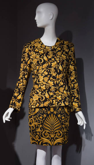 Black and gold Florentine baroque print suit with collarless jacket and straight skirt 