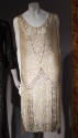 Sleeveless v-neck champagne sequin and bead fringe flapper dress 