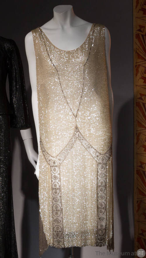 Sleeveless v-neck champagne sequin and bead fringe flapper dress 