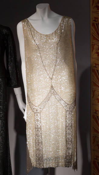Sleeveless v-neck champagne sequin and bead fringe flapper dress 