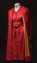 Red knee length dress and matching duster coat with orange and black calico print, button front…