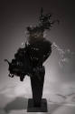 Alternate view of black and grey acrylic splash dress on a black pedestal 