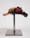 Panama straw hat decorated with black fabric flowers