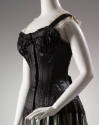 Black satin corset with topstitching and boning, shoulder straps