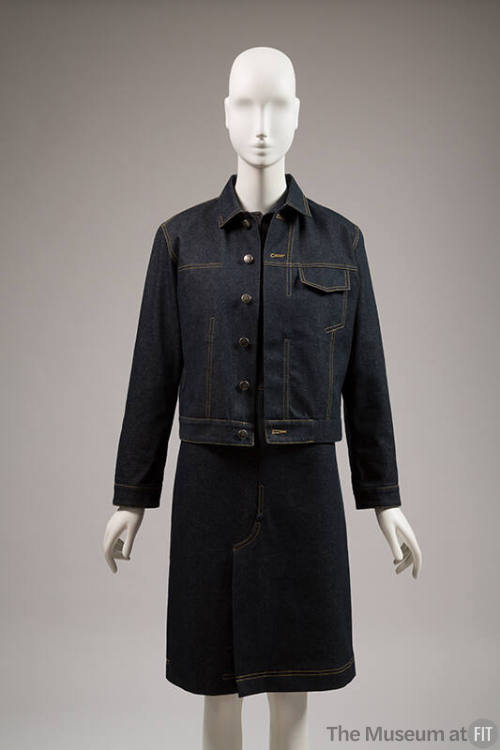 Dark blue denim button front jacket with yellow topstitching over matching knee length dress