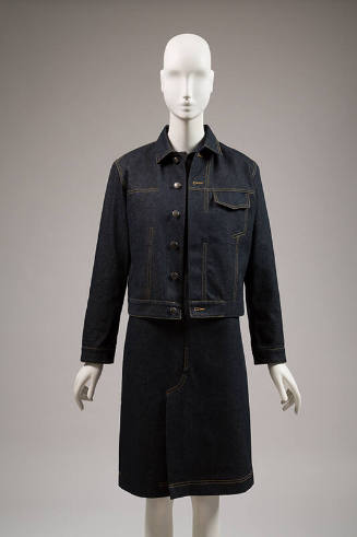 Dark blue denim button front jacket with yellow topstitching over matching knee length dress