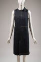 Dark blue denim sleeveless knee length dress with yellow topstitching, single right side collar…