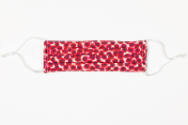 Red, purple and white poppy pattern pleated face mask with elastic ear loops 