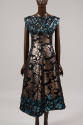 Black sleeveless dress with orange and silver rose pattern and blue and silver floral design bo…