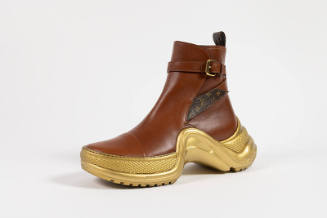 Brown leather ankle sneaker boot with gold sole, ankle buckle strap