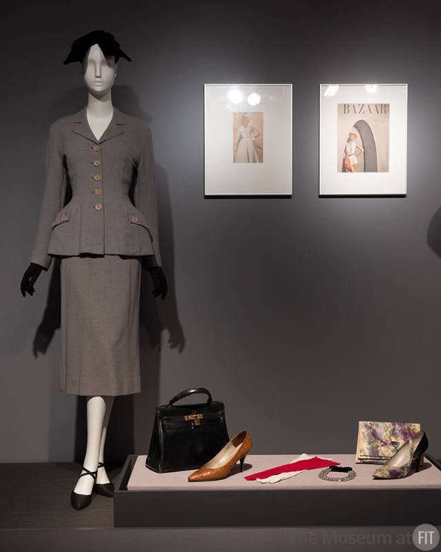 Balenciaga suit and hat, circa 1950, with accessories by Hermès, Roger Vivier, Tréfousse for Balmain, Balenciaga, Roger Vivier for Christian Dior, and Christian Dior, 1947-circa 1960. Louise Dahl-Wolfe photographs on wall, 1950-1954