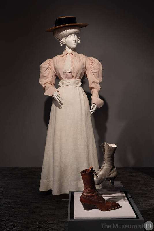Blouse, skirt, and straw boater, 1890-circa 1902, with grey leather boot, circa 1903, and brown leather boot, circa 1905