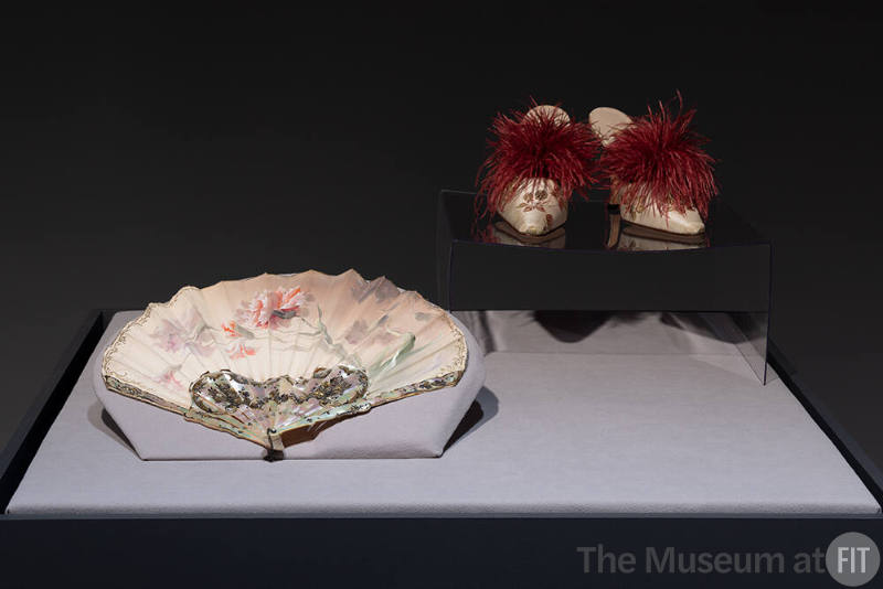 J. Duvelleroy silk fan, 1890s, and Manolo Blahnik silk and feather mules, 1998