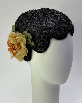Black straw beret with scalloped edge; pink silk rose at side