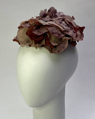 Small hat of large purple silk rose 