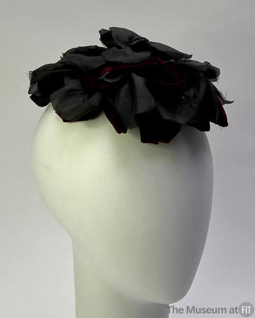Small hat of large black silk rose 