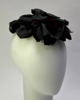 Small hat of large black silk rose 