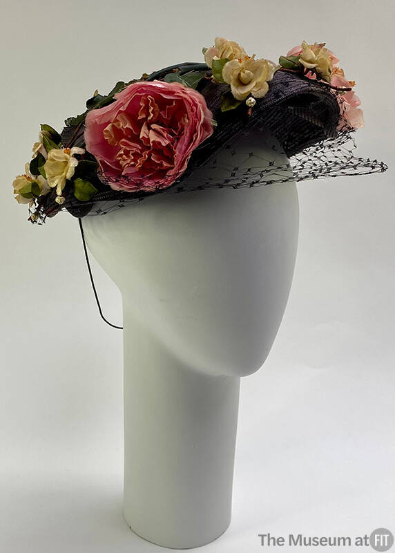 Black hat, pink and white fabric roses, and net