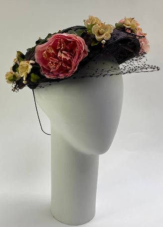 Black hat, pink and white fabric roses, and net