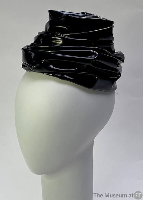 Black plastic turban style hat
