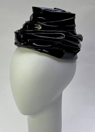 Black plastic turban style hat