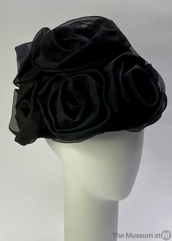 Black organza rosettes on black hat