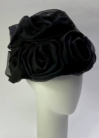 Black organza rosettes on black hat