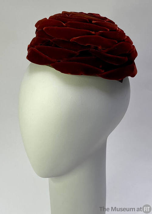 Red velvet hat with layered petal sections 