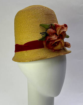 Straw high crown with red velvet ribbon band and silk rose at front