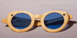 Yellow rounded cat eye sunglasses with bright blue lens