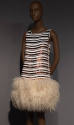 Horizontally striped (coppper and white) sleeveless tank style mini dress; wide ostrich feather…