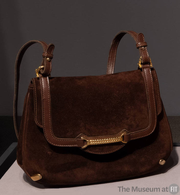 Brown suede bag with brown leather trim and gold hardware