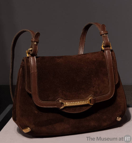 Brown suede bag with brown leather trim and gold hardware