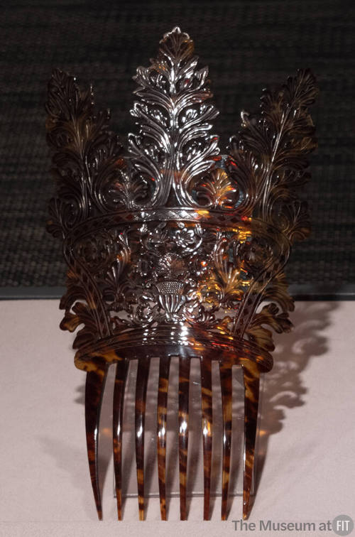 Brown tortoise shell comb with high Spanish cut and of three large leaf motifs over central flo…
