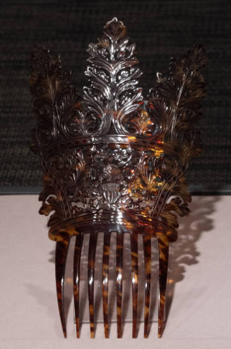 Brown tortoise shell comb with high Spanish cut and of three large leaf motifs over central flo…