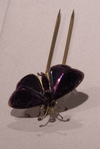 Purple glass butterfly hat pin with gold metal accents and double prong