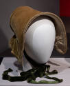 Light olive green/tan velvet bonnet with dark green ties and flat back