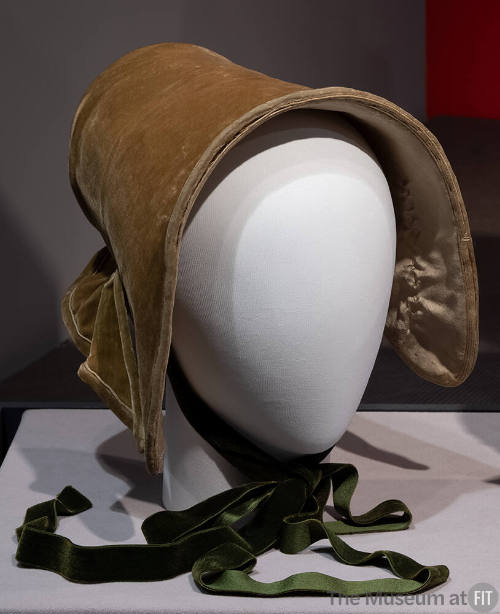 Light olive green/tan velvet bonnet with dark green ties and flat back