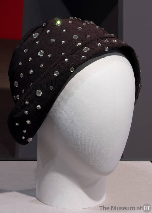 Black bonnet with rhinestones; narrow brim