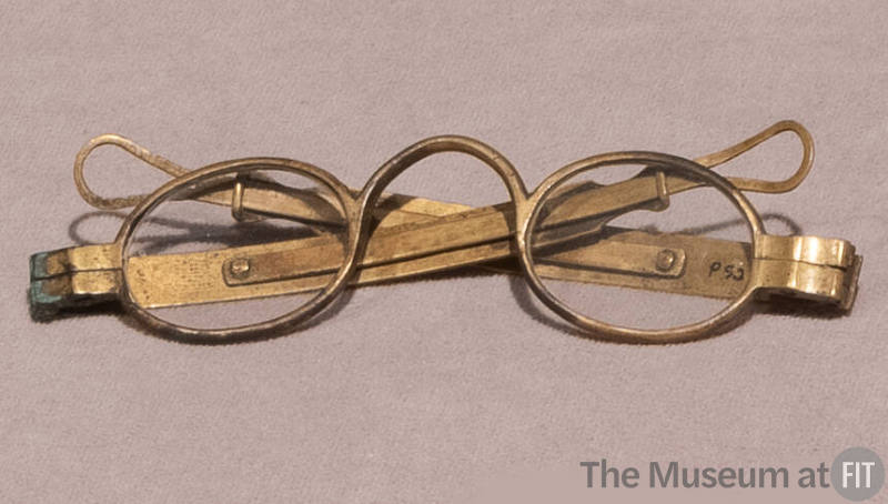 Brass eyeglasses with oval lenses