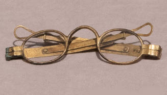 Brass eyeglasses with oval lenses